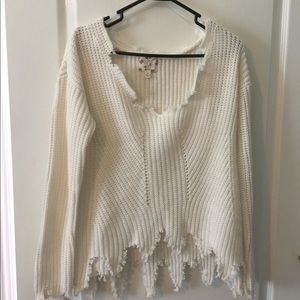 Distressed sweater